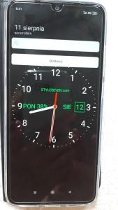 Zdjęcie przedmiotowego zegara z dwoma paskami.jpg